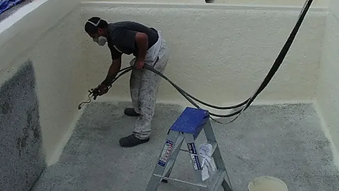 Applying waterproof coating inside a concrete water tank